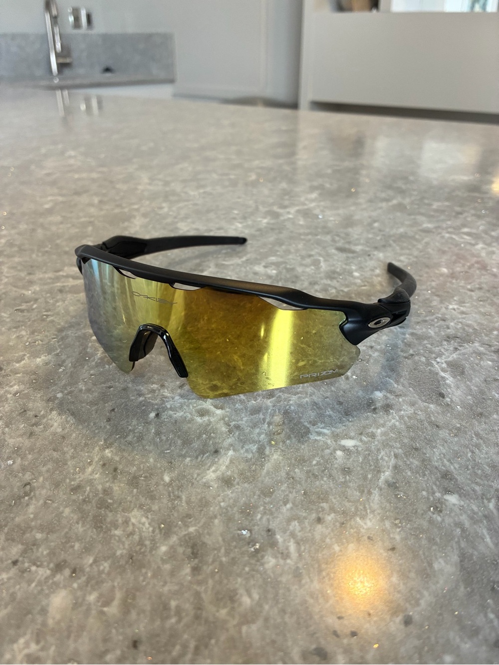 Oakley Radar EV Path Sunglasses with gold prizm lenses and black frame